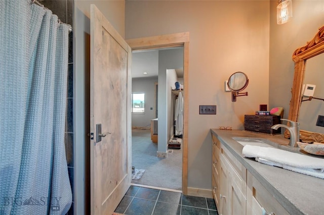 11762 Gooch Hill Rd, Gallatin Gateway, MT 59730 - bathroom featuring vanity, tile patterned floors, curtained shower, and baseboards