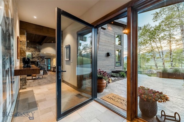 entryway featuring a fireplace
