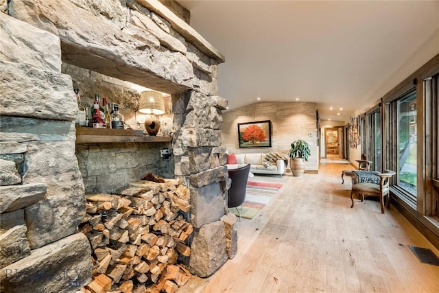 living room with hardwood / wood-style floors, vaulted ceiling, and recessed lighting