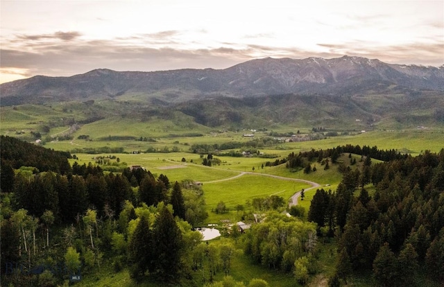 view of mountain background with rural landscape