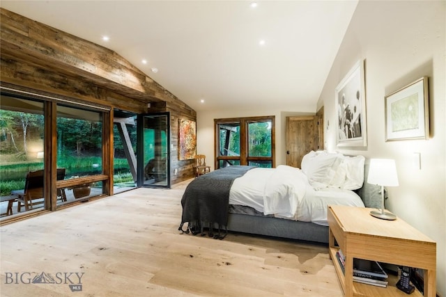 bedroom with lofted ceiling, wood finished floors, and recessed lighting