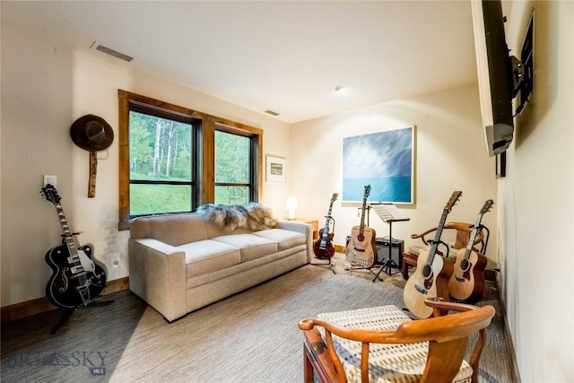 sitting room featuring baseboards