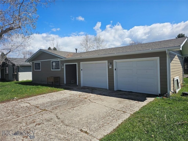 single story home with driveway, an attached garage, a front yard, and a shingled roof