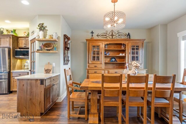 754 Milestone Dr, Belgrade, MT 59714 - dining room featuring a chandelier, dark wood-style floors, recessed lighting, and baseboards