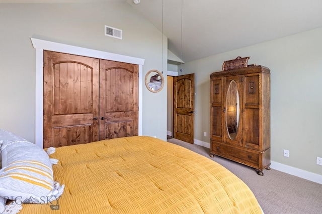 754 Milestone Dr, Belgrade, MT 59714 - carpeted bedroom with vaulted ceiling and baseboards