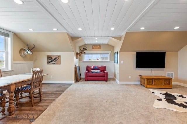754 Milestone Dr, Belgrade, MT 59714 - living area featuring carpet flooring, vaulted ceiling, recessed lighting, baseboards, and wood finished floors