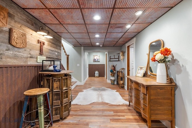 754 Milestone Dr, Belgrade, MT 59714 - entrance foyer featuring stairway, light wood-style flooring, recessed lighting, wooden walls, and baseboards