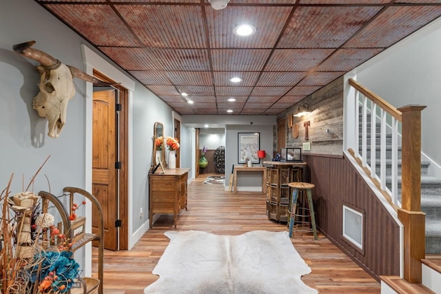754 Milestone Dr, Belgrade, MT 59714 - bar area with recessed lighting, light wood finished floors, stairway, and baseboards