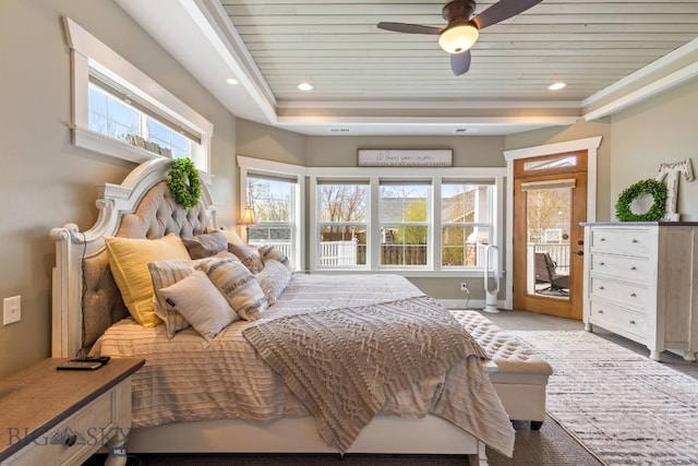 754 Milestone Dr, Belgrade, MT 59714 - bedroom with a tray ceiling, access to outside, wooden ceiling, baseboards, and light carpet