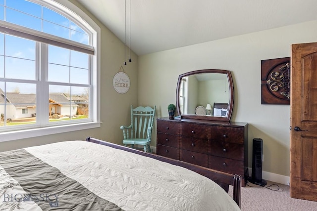 754 Milestone Dr, Belgrade, MT 59714 - bedroom featuring carpet flooring, lofted ceiling, and baseboards