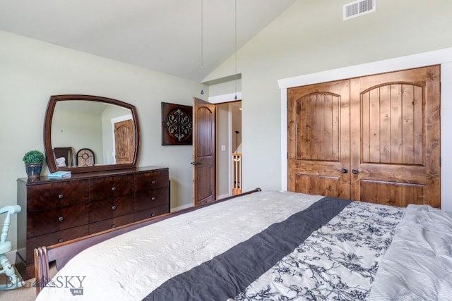 754 Milestone Dr, Belgrade, MT 59714 - bedroom featuring lofted ceiling, carpet, and a closet
