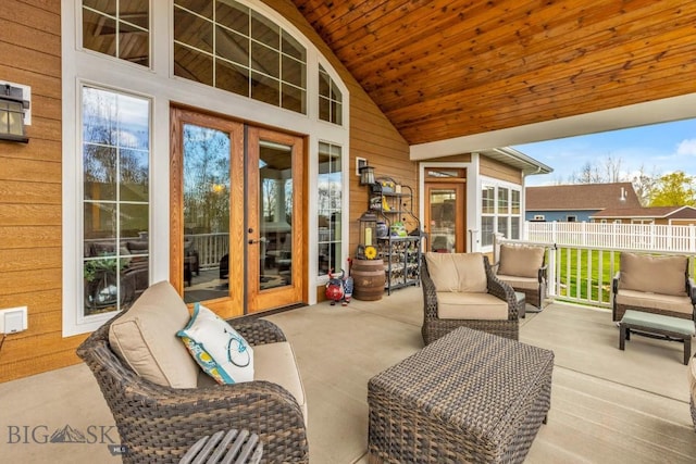 754 Milestone Dr, Belgrade, MT 59714 - sunroom / solarium featuring french doors, vaulted ceiling, and outdoor lounge area