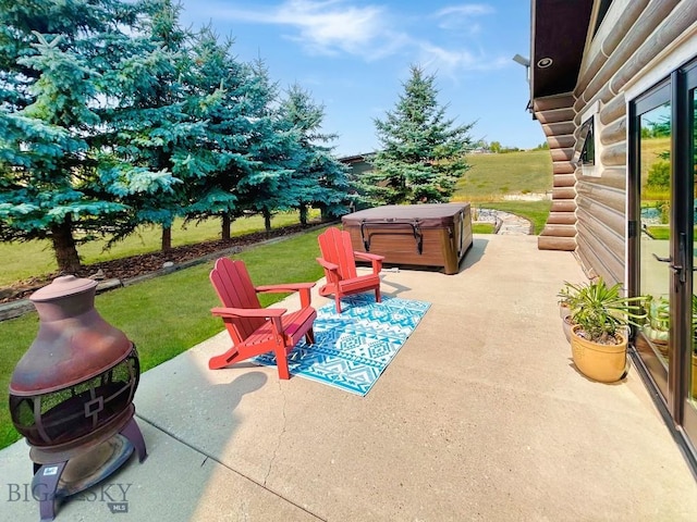 view of patio with a hot tub