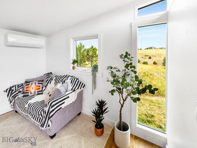 13013 Little Holland Rd, Manhattan, MT 59741 - bedroom featuring a wall mounted air conditioner, lofted ceiling, multiple windows, and wood finished floors