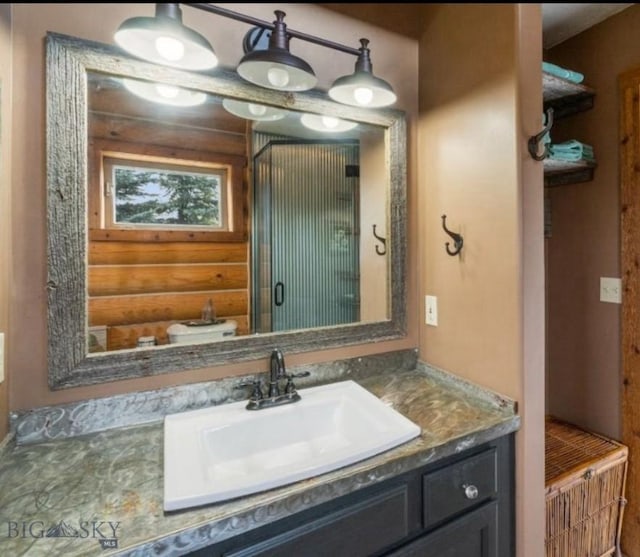 13013 Little Holland Rd, Manhattan, MT 59741 - bathroom with vanity and rustic walls
