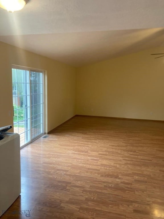 303 Treasure, Bozeman, MT 59718 - spare room featuring wood finished floors