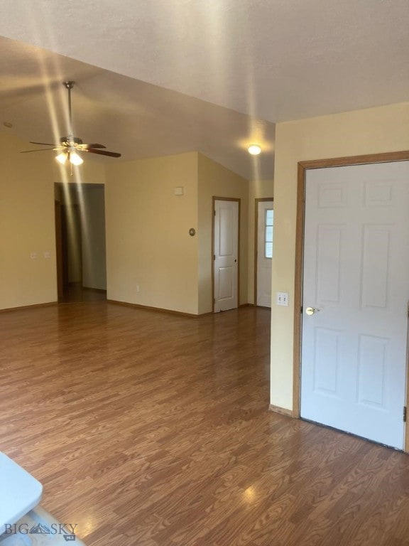 303 Treasure, Bozeman, MT 59718 - unfurnished living room featuring light wood-style flooring and a ceiling fan