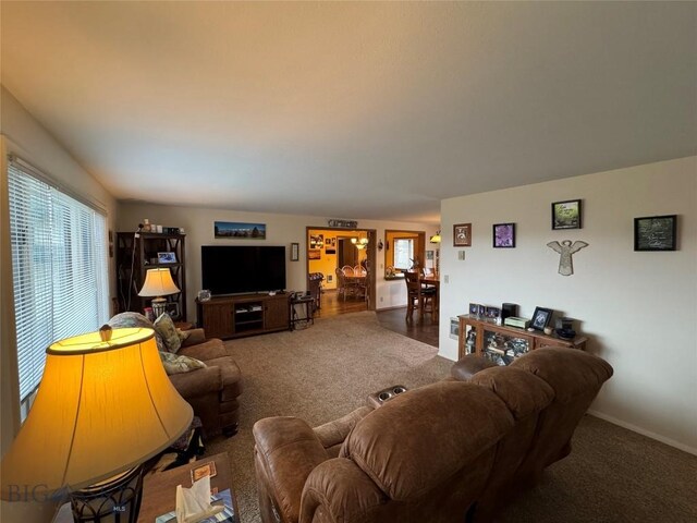 105 Country Club Ln, Butte, MT 59701 - carpeted living area with plenty of natural light and baseboards