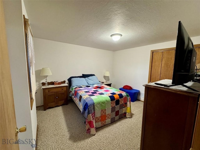 105 Country Club Ln, Butte, MT 59701 - bedroom featuring light carpet and a textured ceiling