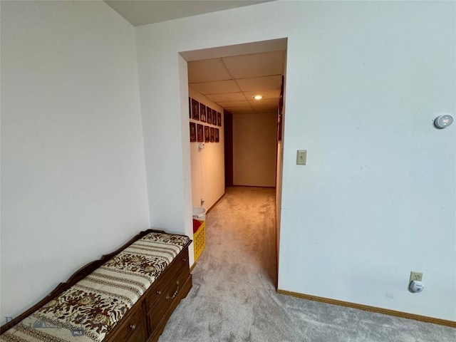 105 Country Club Ln, Butte, MT 59701 - hallway featuring carpet flooring, a drop ceiling, and baseboards