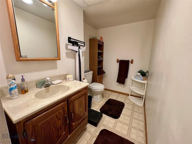 105 Country Club Ln, Butte, MT 59701 - bathroom with vanity, toilet, and tile patterned floors