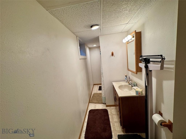 105 Country Club Ln, Butte, MT 59701 - bathroom featuring a drop ceiling and vanity