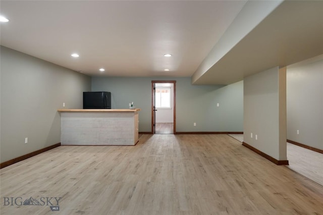 317 Shelter Grv, Bozeman, MT 59718 - unfurnished living room with baseboards, recessed lighting, and wood finished floors