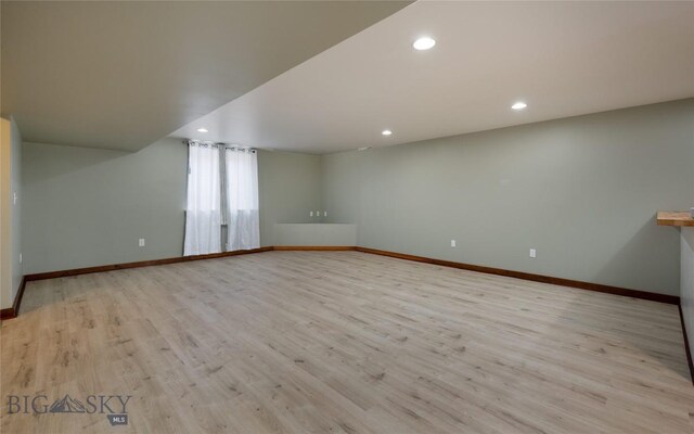 317 Shelter Grv, Bozeman, MT 59718 - spare room with baseboards, wood finished floors, and recessed lighting