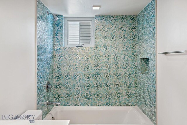 full bath with toilet and shower / bath combination