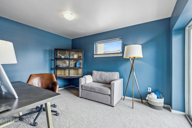 home office featuring carpet floors and baseboards
