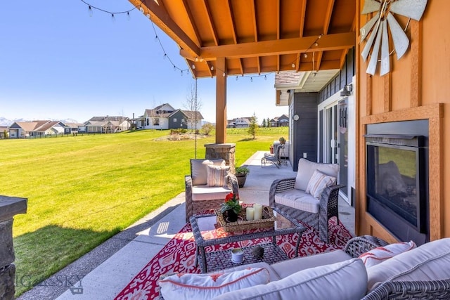 view of patio with outdoor lounge area and a residential view
