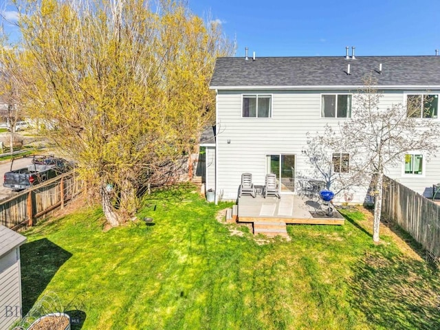 rear view of property with a deck