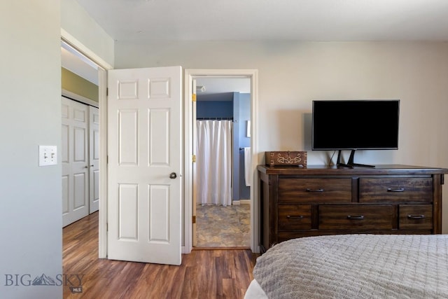 bedroom featuring wood finished floors
