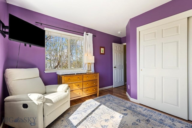 sitting room featuring wood finished floors and baseboards