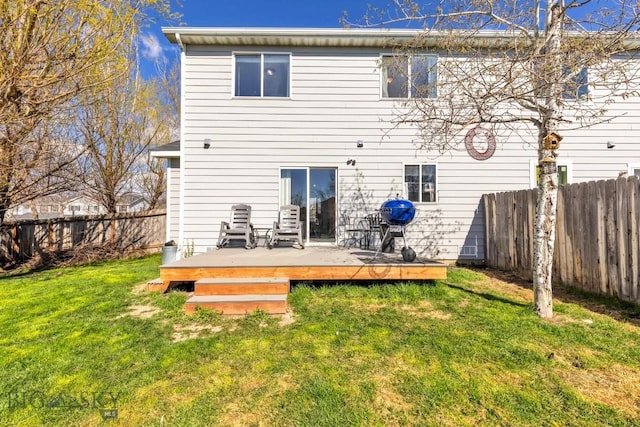 back of house featuring a deck