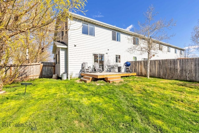 back of property with a deck