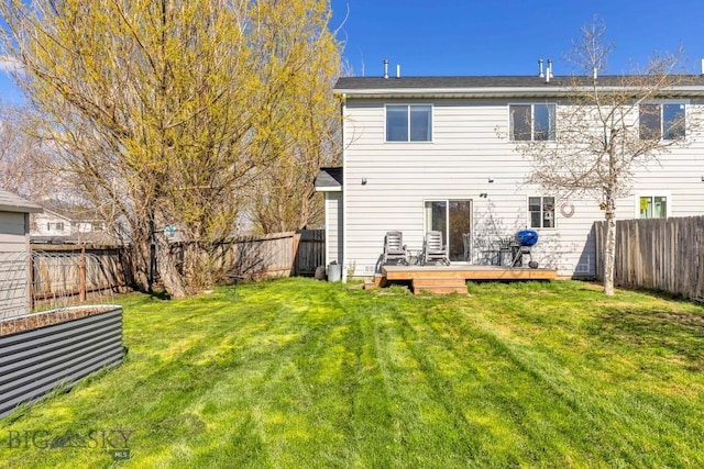back of property featuring a wooden deck