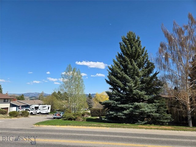 1104 N Spruce Dr, Bozeman, MT 59715 - view of asphalt street with a mountain view