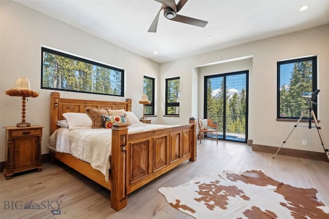 bedroom with access to outside, light wood-style floors, recessed lighting, baseboards, and a ceiling fan