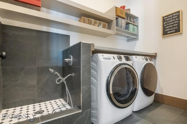 washroom featuring washer and dryer