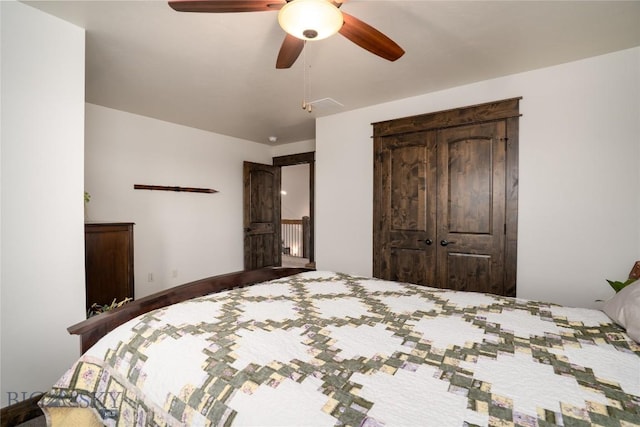 bedroom with a closet and ceiling fan