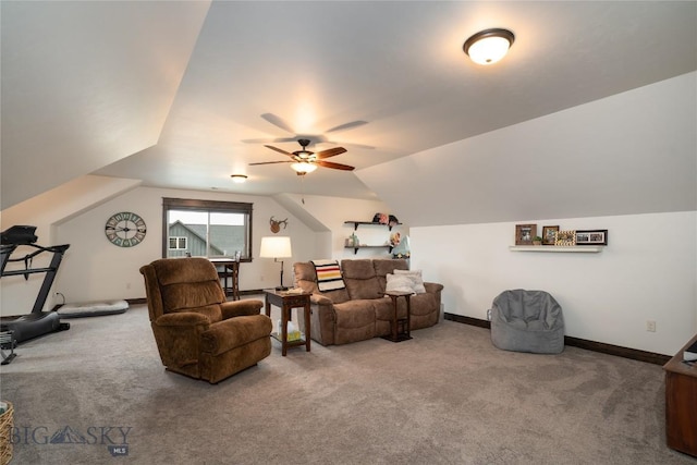 living room featuring carpet, vaulted ceiling, a ceiling fan, and baseboards