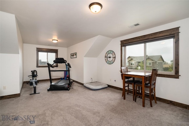 workout area with carpet and baseboards