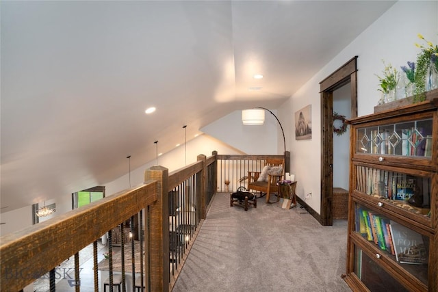 hall featuring carpet floors, lofted ceiling, and recessed lighting