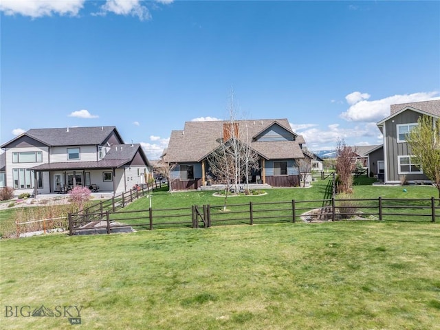 view of yard featuring a residential view