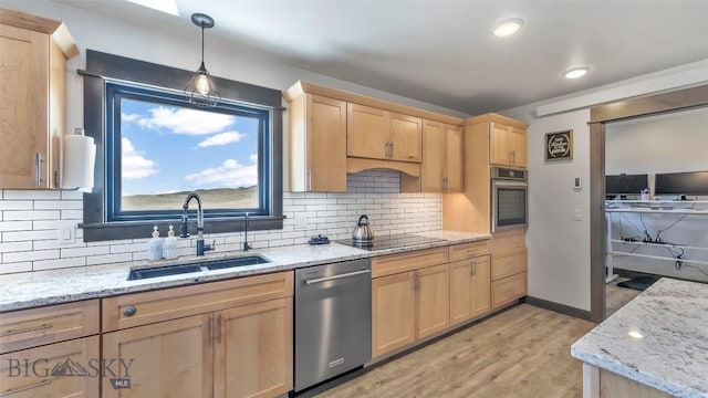 2200 Sugarloaf Mountain Rd, Glen, MT 59732 - kitchen featuring appliances with stainless steel finishes, light brown cabinets, a sink, tasteful backsplash, and recessed lighting