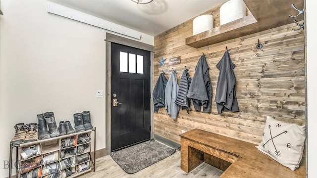 2200 Sugarloaf Mountain Rd, Glen, MT 59732 - mudroom featuring wood walls and wood finished floors