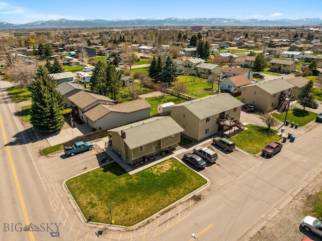 500/502 Idaho St, Belgrade, MT 59714 - aerial perspective of suburban area with mountains