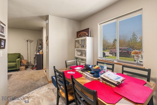 500/502 Idaho St, Belgrade, MT 59714 - dining area featuring carpet floors