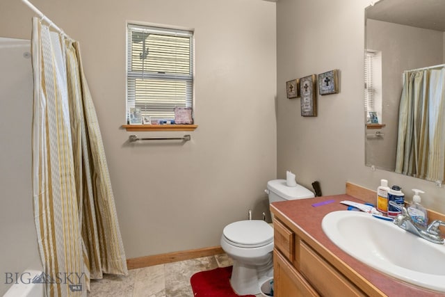 500/502 Idaho St, Belgrade, MT 59714 - bathroom featuring a shower with curtain, toilet, and vanity